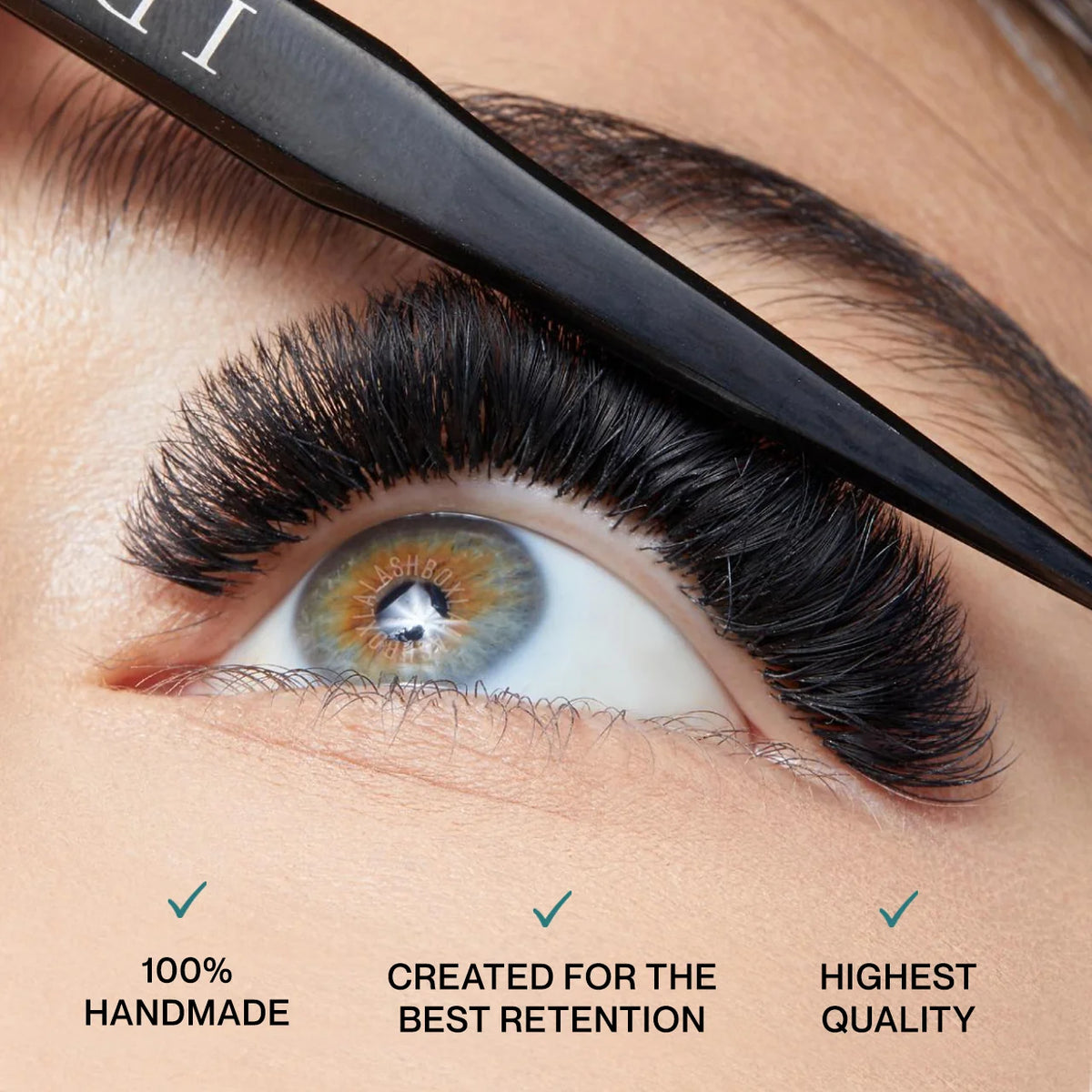 Eyelash with a tweezer applying false eyelashes, labeled as 100% handmade, best retention, and highest quality cashmere 0.07 lash box LA lashes available in Australia  